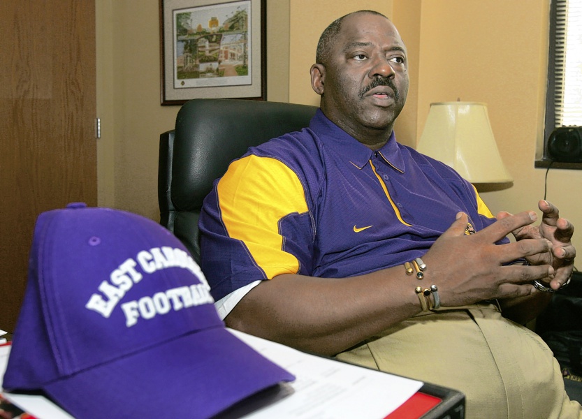ECU Coach Ruffin McNeill may believe in the power of the Q-Ray bracelet